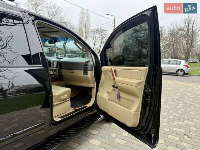 Черный Ниссан Армада, объемом двигателя 5.6 л и пробегом 267 тыс. км за 10999 $, фото 43 на Automoto.ua