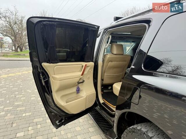 Черный Ниссан Армада, объемом двигателя 5.6 л и пробегом 267 тыс. км за 10999 $, фото 60 на Automoto.ua