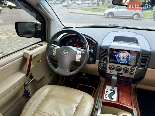 Черный Ниссан Армада, объемом двигателя 5.6 л и пробегом 267 тыс. км за 10999 $, фото 78 на Automoto.ua