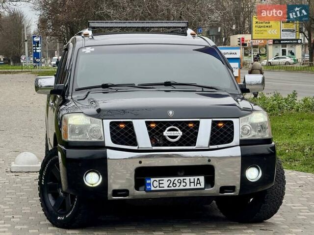 Черный Ниссан Армада, объемом двигателя 5.6 л и пробегом 267 тыс. км за 10999 $, фото 27 на Automoto.ua