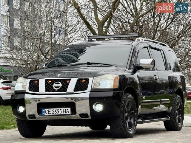 Черный Ниссан Армада, объемом двигателя 5.6 л и пробегом 267 тыс. км за 10999 $, фото 2 на Automoto.ua