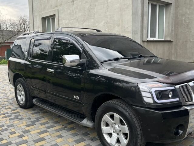 Черный Ниссан Армада, объемом двигателя 0 л и пробегом 244 тыс. км за 11000 $, фото 2 на Automoto.ua