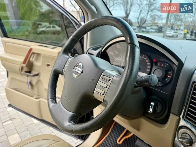 Черный Ниссан Армада, объемом двигателя 5.6 л и пробегом 267 тыс. км за 10999 $, фото 56 на Automoto.ua