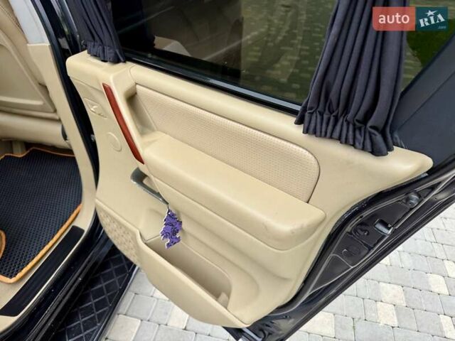 Черный Ниссан Армада, объемом двигателя 5.6 л и пробегом 267 тыс. км за 10999 $, фото 69 на Automoto.ua