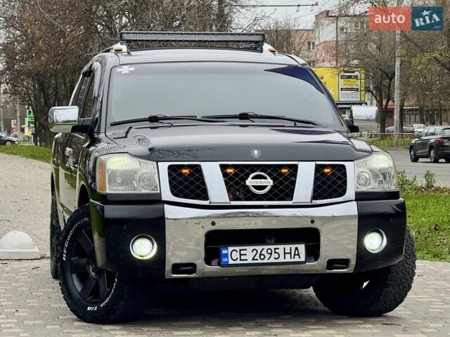 Черный Ниссан Армада, объемом двигателя 5.6 л и пробегом 267 тыс. км за 10999 $, фото 21 на Automoto.ua