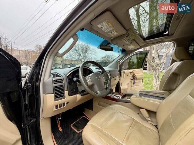 Черный Ниссан Армада, объемом двигателя 5.6 л и пробегом 267 тыс. км за 10999 $, фото 39 на Automoto.ua
