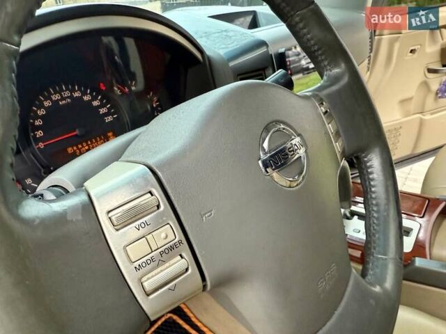 Черный Ниссан Армада, объемом двигателя 5.6 л и пробегом 267 тыс. км за 10999 $, фото 41 на Automoto.ua