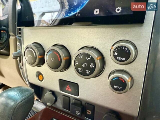 Черный Ниссан Армада, объемом двигателя 5.6 л и пробегом 267 тыс. км за 10999 $, фото 52 на Automoto.ua