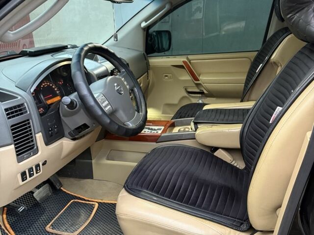 Ниссан Армада 2006 в Одессе на Automoto.ua Черный Ниссан Армада, объемом двигателя 5.6 л и пробегом 240 тыс. км за 13000 $, фото 9 на Automoto.ua