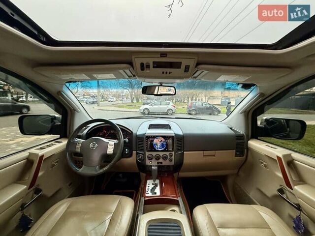 Черный Ниссан Армада, объемом двигателя 5.6 л и пробегом 267 тыс. км за 10999 $, фото 74 на Automoto.ua
