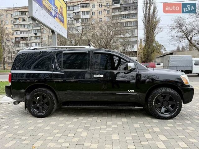 Черный Ниссан Армада, объемом двигателя 5.6 л и пробегом 267 тыс. км за 10999 $, фото 6 на Automoto.ua