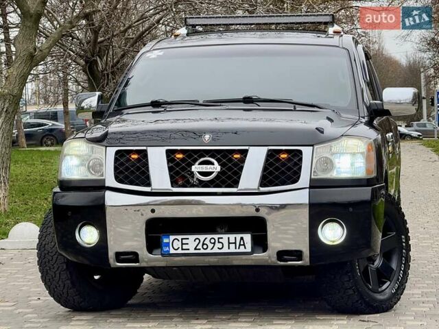 Черный Ниссан Армада, объемом двигателя 5.6 л и пробегом 267 тыс. км за 10999 $, фото 8 на Automoto.ua