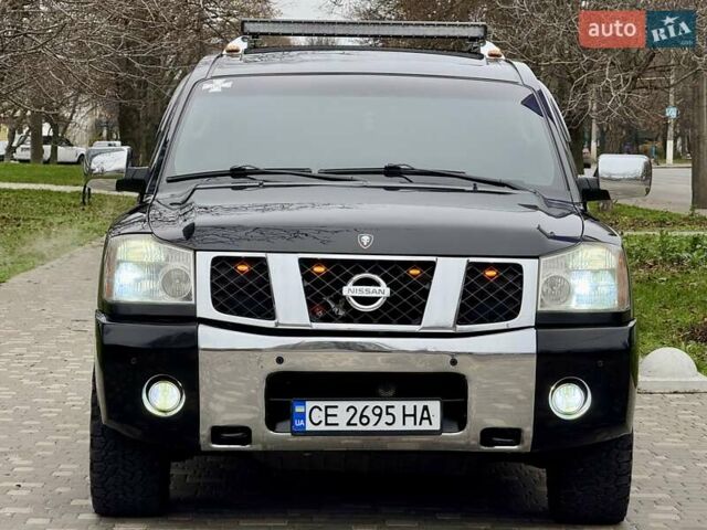 Черный Ниссан Армада, объемом двигателя 5.6 л и пробегом 267 тыс. км за 10999 $, фото 4 на Automoto.ua
