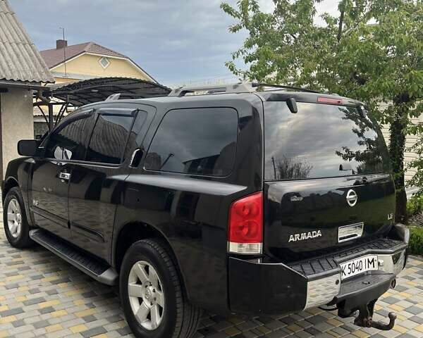 Чорний Ніссан Armada, об'ємом двигуна 5.6 л та пробігом 244 тис. км за 10999 $, фото 3 на Automoto.ua