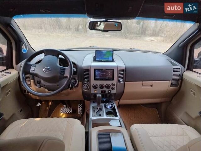 Черный Ниссан Армада, объемом двигателя 5.6 л и пробегом 255 тыс. км за 8000 $, фото 9 на Automoto.ua