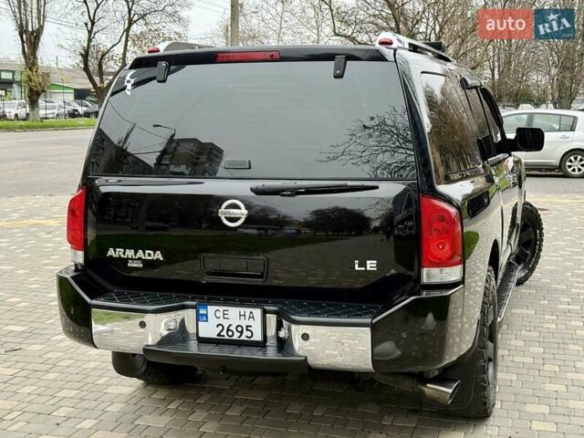 Черный Ниссан Армада, объемом двигателя 5.6 л и пробегом 267 тыс. км за 10999 $, фото 17 на Automoto.ua