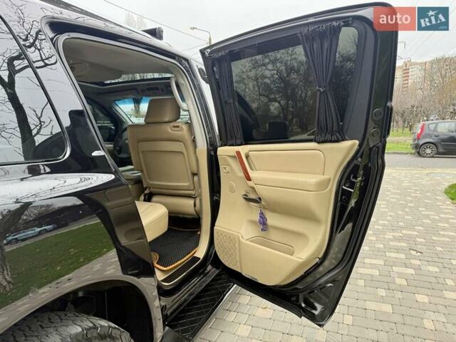 Черный Ниссан Армада, объемом двигателя 5.6 л и пробегом 267 тыс. км за 10999 $, фото 65 на Automoto.ua