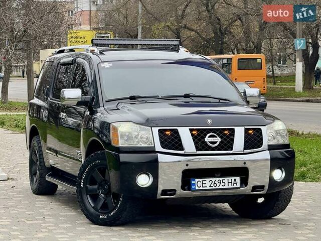 Черный Ниссан Армада, объемом двигателя 5.6 л и пробегом 267 тыс. км за 10999 $, фото 22 на Automoto.ua
