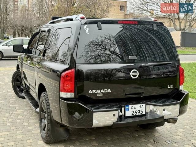 Черный Ниссан Армада, объемом двигателя 5.6 л и пробегом 267 тыс. км за 10999 $, фото 25 на Automoto.ua