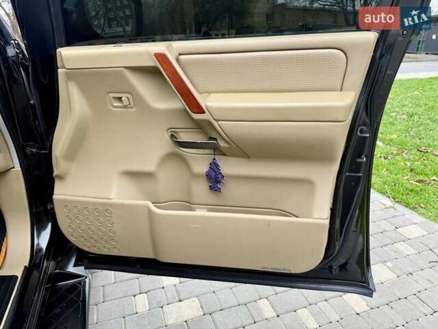 Черный Ниссан Армада, объемом двигателя 5.6 л и пробегом 267 тыс. км за 10999 $, фото 48 на Automoto.ua