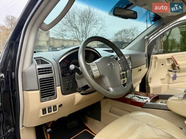Черный Ниссан Армада, объемом двигателя 5.6 л и пробегом 267 тыс. км за 10999 $, фото 38 на Automoto.ua