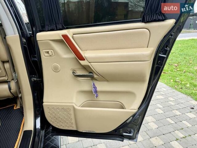 Черный Ниссан Армада, объемом двигателя 5.6 л и пробегом 267 тыс. км за 10999 $, фото 64 на Automoto.ua