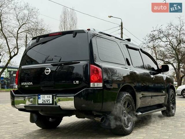 Черный Ниссан Армада, объемом двигателя 5.6 л и пробегом 267 тыс. км за 10999 $, фото 9 на Automoto.ua