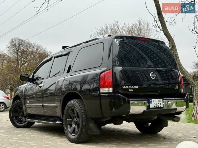 Черный Ниссан Армада, объемом двигателя 5.6 л и пробегом 267 тыс. км за 10999 $, фото 26 на Automoto.ua