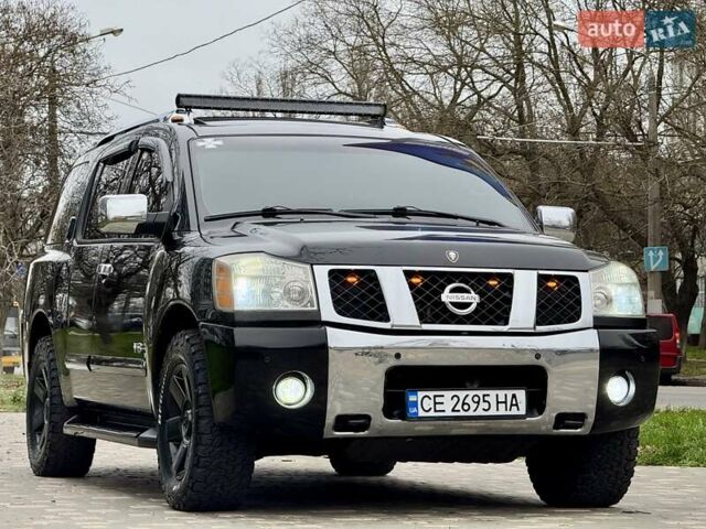 Черный Ниссан Армада, объемом двигателя 5.6 л и пробегом 267 тыс. км за 10999 $, фото 3 на Automoto.ua