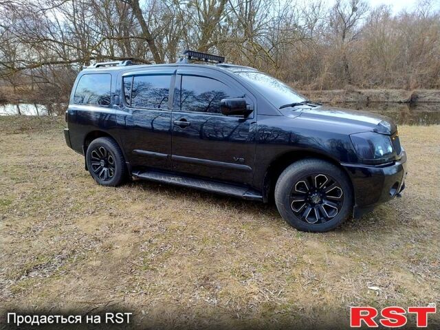 Черный Ниссан Армада, объемом двигателя 5.6 л и пробегом 255 тыс. км за 8000 $, фото 2 на Automoto.ua