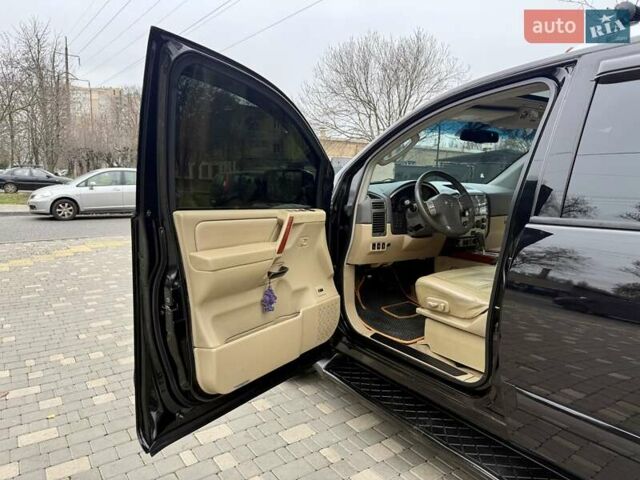 Черный Ниссан Армада, объемом двигателя 5.6 л и пробегом 267 тыс. км за 10999 $, фото 33 на Automoto.ua