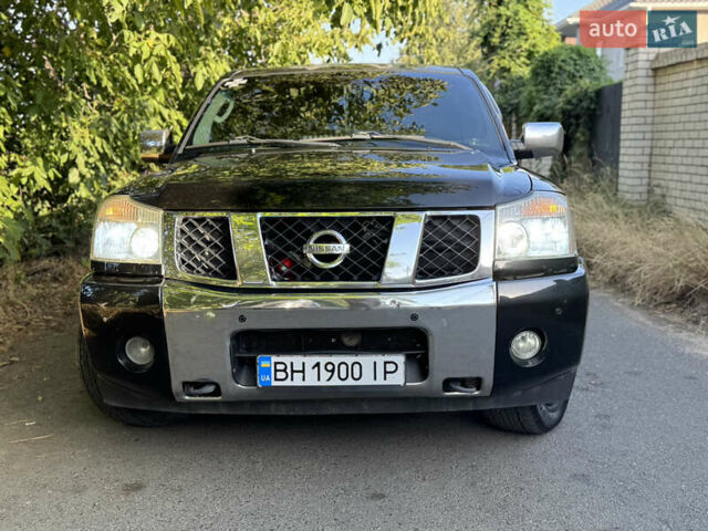 Чорний Ніссан Armada, об'ємом двигуна 0 л та пробігом 230 тис. км за 12500 $, фото 1 на Automoto.ua