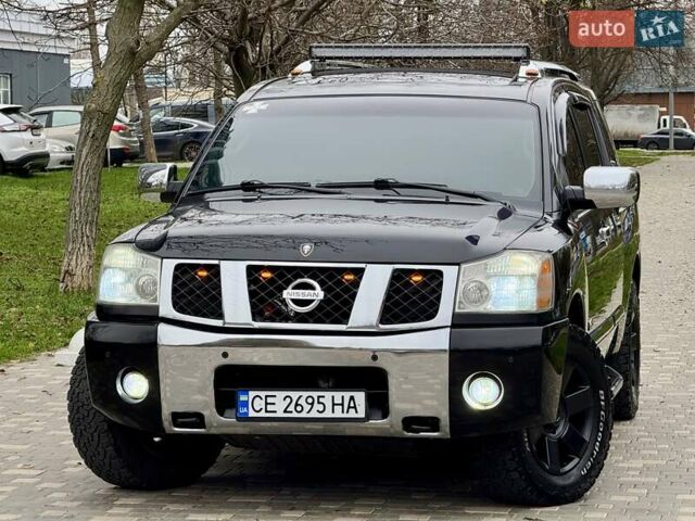 Черный Ниссан Армада, объемом двигателя 5.6 л и пробегом 267 тыс. км за 10999 $, фото 19 на Automoto.ua