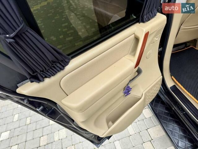 Черный Ниссан Армада, объемом двигателя 5.6 л и пробегом 267 тыс. км за 10999 $, фото 58 на Automoto.ua