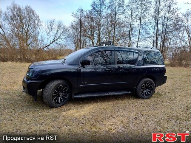 Черный Ниссан Армада, объемом двигателя 5.6 л и пробегом 255 тыс. км за 8000 $, фото 3 на Automoto.ua