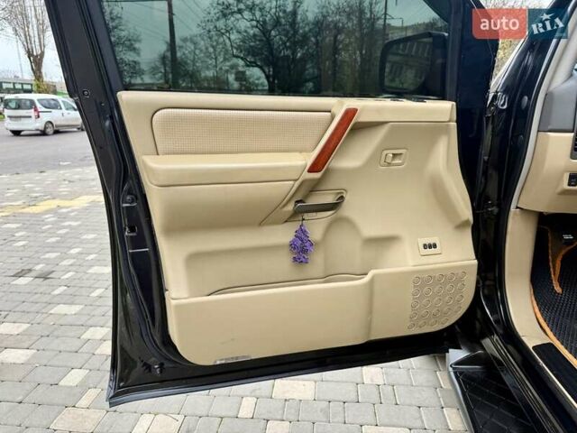 Черный Ниссан Армада, объемом двигателя 5.6 л и пробегом 267 тыс. км за 10999 $, фото 32 на Automoto.ua