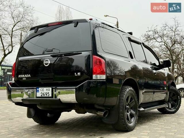 Черный Ниссан Армада, объемом двигателя 5.6 л и пробегом 267 тыс. км за 10999 $, фото 18 на Automoto.ua