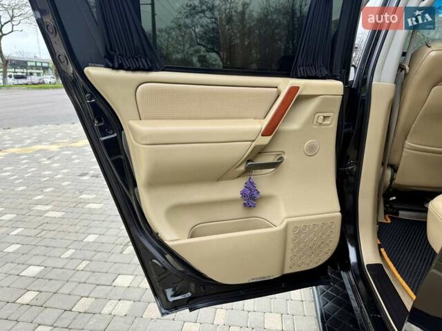 Черный Ниссан Армада, объемом двигателя 5.6 л и пробегом 267 тыс. км за 10999 $, фото 59 на Automoto.ua