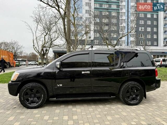 Черный Ниссан Армада, объемом двигателя 5.6 л и пробегом 267 тыс. км за 10999 $, фото 5 на Automoto.ua