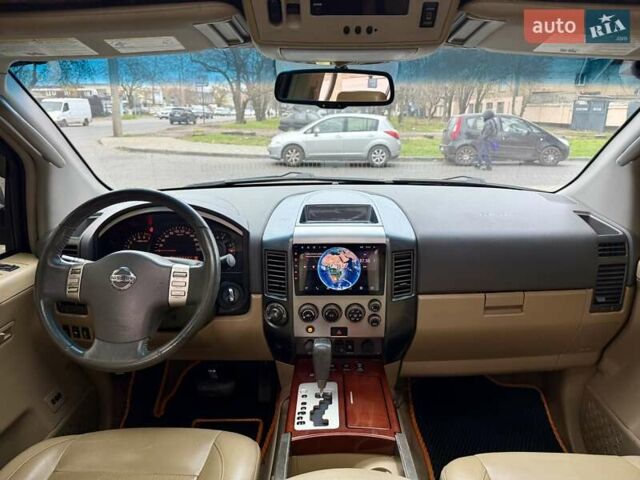 Черный Ниссан Армада, объемом двигателя 5.6 л и пробегом 267 тыс. км за 10999 $, фото 73 на Automoto.ua