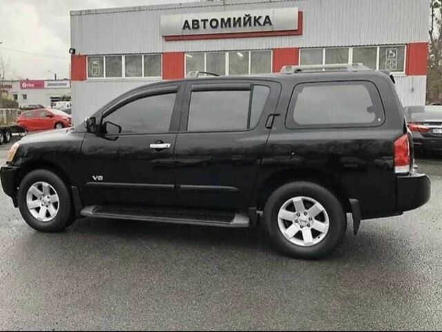 Черный Ниссан Армада, объемом двигателя 5.6 л и пробегом 330 тыс. км за 13700 $, фото 3 на Automoto.ua