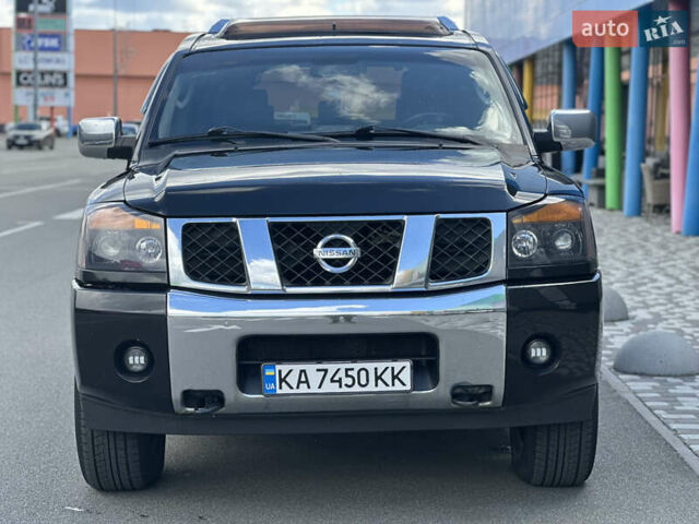 Черный Ниссан Армада, объемом двигателя 5.6 л и пробегом 265 тыс. км за 9500 $, фото 1 на Automoto.ua