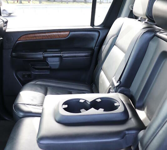 Черный Ниссан Армада, объемом двигателя 5.56 л и пробегом 191 тыс. км за 14999 $, фото 19 на Automoto.ua