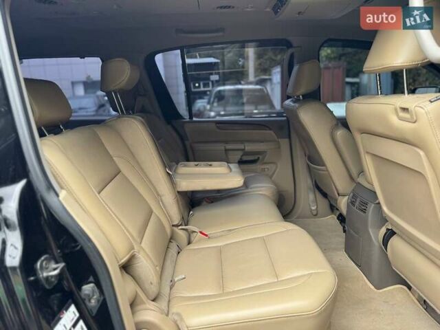 Черный Ниссан Армада, объемом двигателя 5.55 л и пробегом 180 тыс. км за 10900 $, фото 19 на Automoto.ua