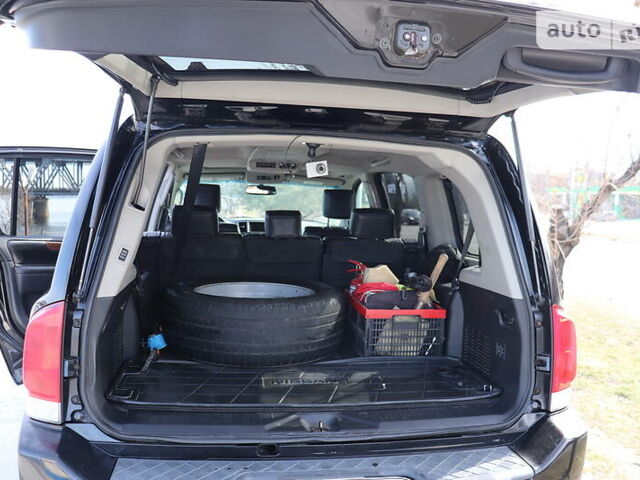 Черный Ниссан Армада, объемом двигателя 5.56 л и пробегом 191 тыс. км за 14999 $, фото 10 на Automoto.ua