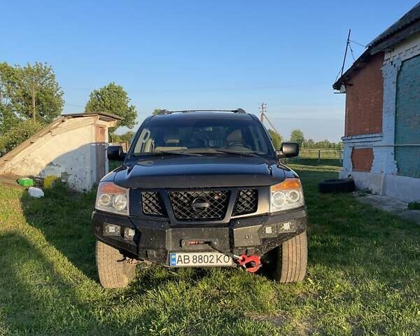Черный Ниссан Армада, объемом двигателя 5.55 л и пробегом 270 тыс. км за 14100 $, фото 6 на Automoto.ua