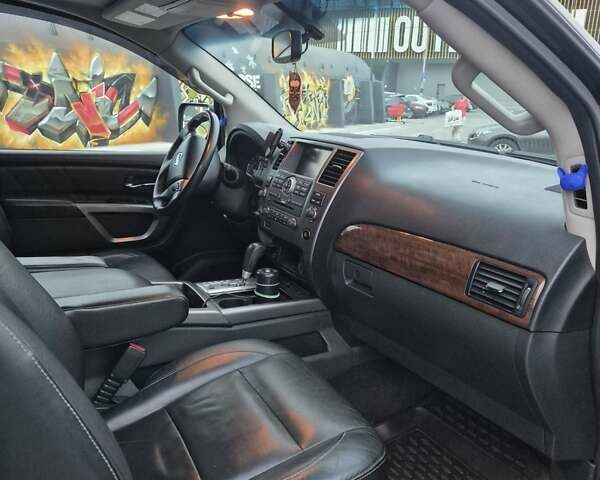 Ниссан Армада 2014 в Киеве на Automoto.ua Черный Ниссан Армада, объемом двигателя 5.55 л и пробегом 175 тыс. км за 20000 $, фото 11 на Automoto.ua