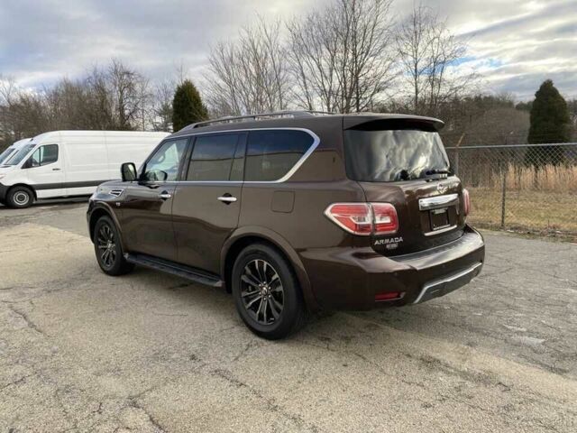 Коричневый Ниссан Армада, объемом двигателя 5.6 л и пробегом 49 тыс. км за 13200 $, фото 2 на Automoto.ua