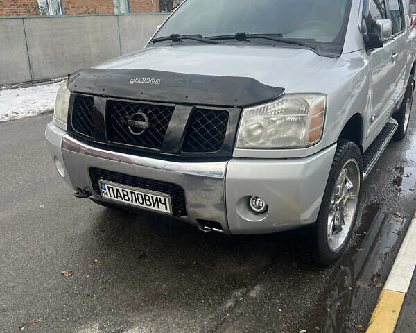 Серый Ниссан Армада, объемом двигателя 5.6 л и пробегом 321 тыс. км за 12500 $, фото 5 на Automoto.ua