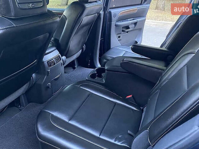 Синій Ніссан Armada, об'ємом двигуна 5.55 л та пробігом 126 тис. км за 15000 $, фото 17 на Automoto.ua